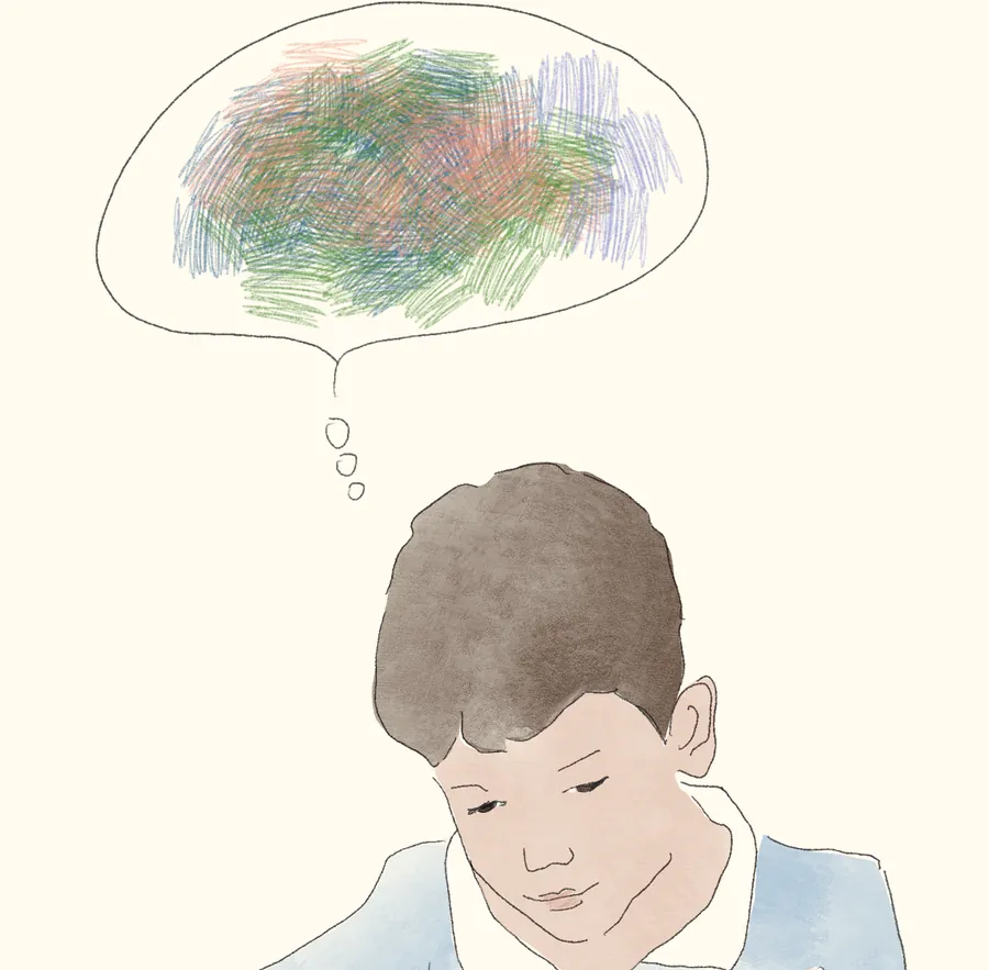 Ζωγραφιά ενός αγοριού με ένα συννεφάκι σκέψης γεμάτο μπερδεμένα χρώματα